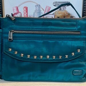 Lug Turquoise Crossbody Bag with Metallic Accents- Pacer 2